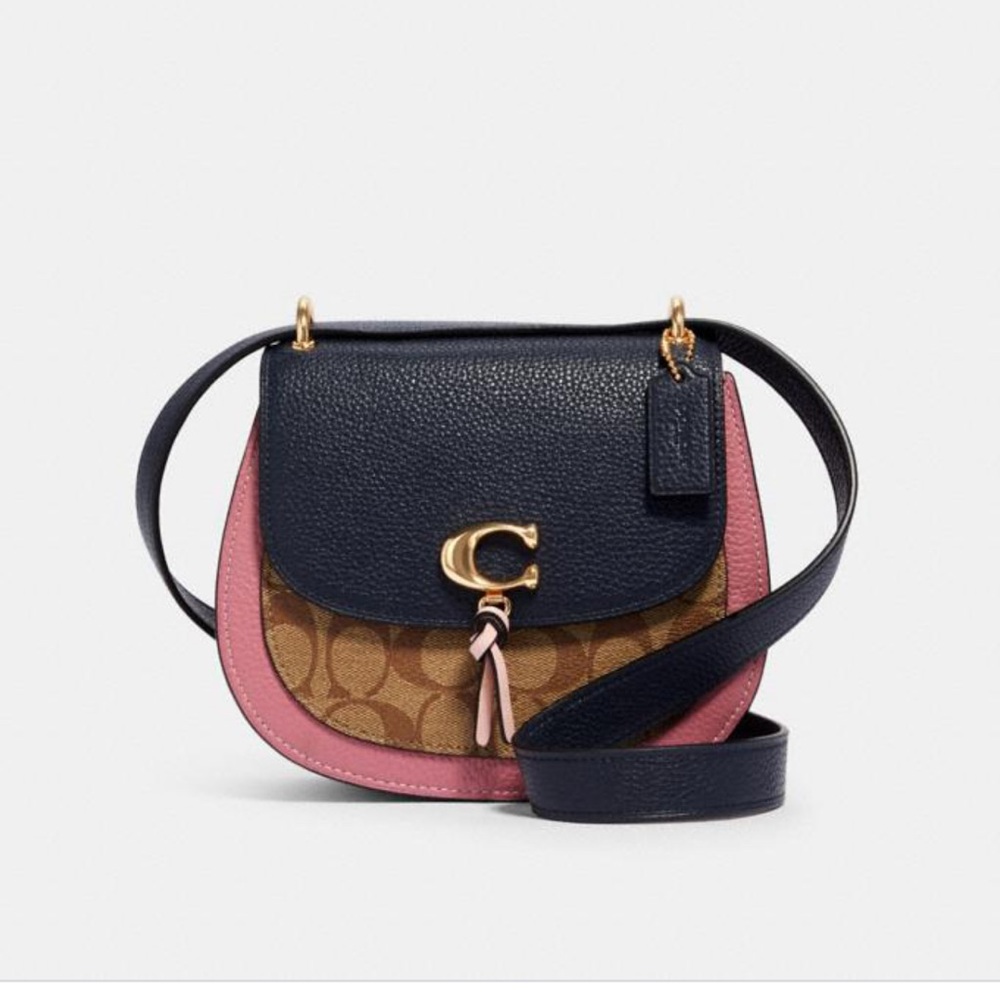 Coach remi saddle crossbody bag